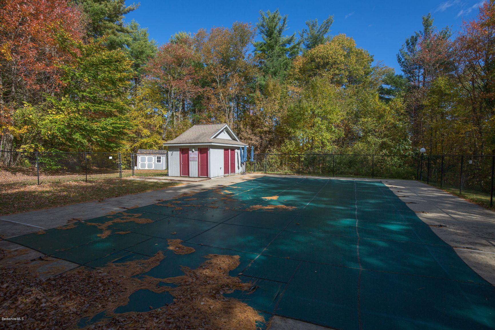 358 Harrington Road Otis, MA 01253 - Photo 51 of 52 a backyard of a house with lots of green space
