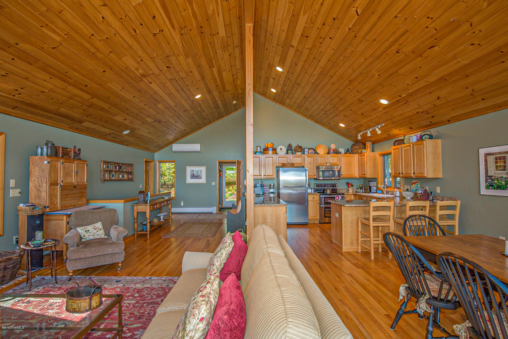 358 Harrington Road Otis, MA 01253 - Photo 8 of 52 a living room with furniture and a wooden floor