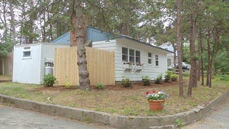 15 Massasoit Road, Unit 2 Wellfleet, MA 02667 - Photo 11 of 11 a front view of a house with garden