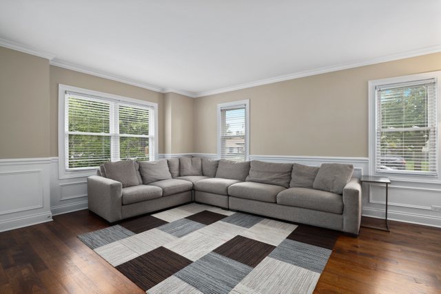 934 Spring Road Elmhurst, IL 60126 - Photo 3 of 27 a living room with furniture and a large window