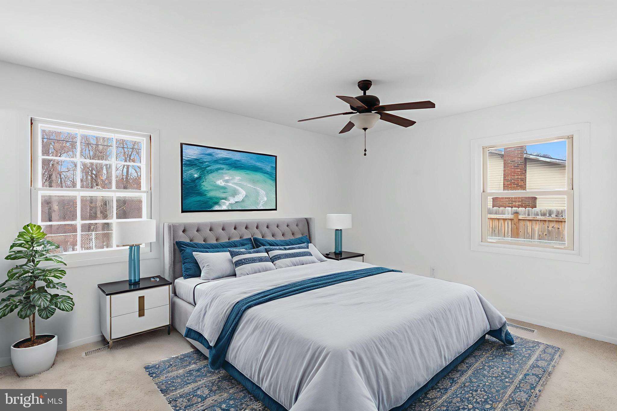 12202 Rustic Hill Drive Bowie, MD 20715 - Photo 14 of 34 a bedroom with bed and a window