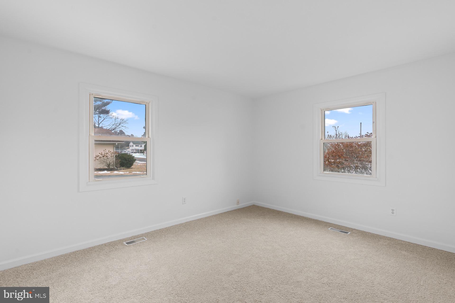 12202 Rustic Hill Drive Bowie, MD 20715 - Photo 17 of 34 an empty room with a window