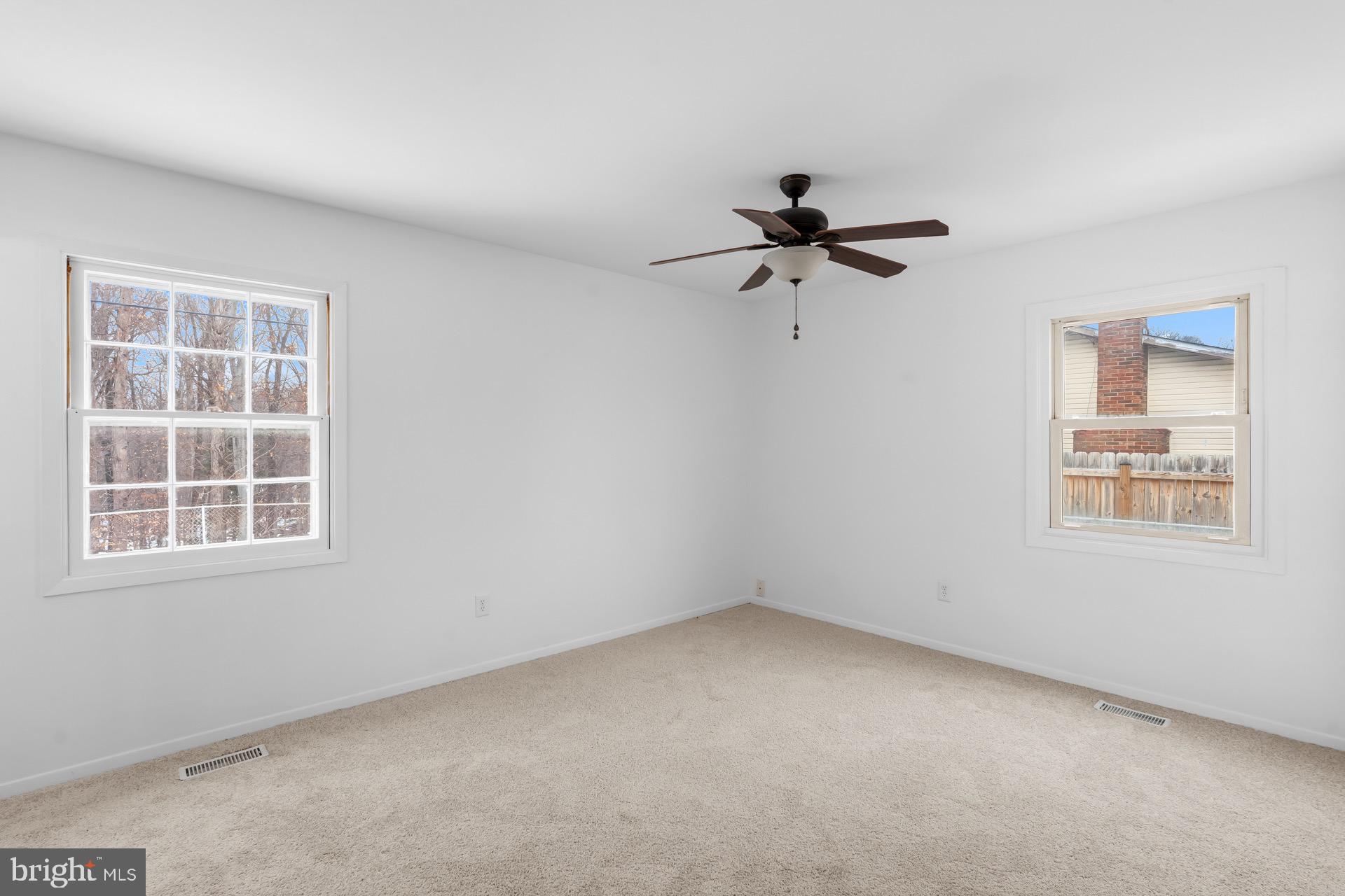 12202 Rustic Hill Drive Bowie, MD 20715 - Photo 20 of 34 an empty room with a window