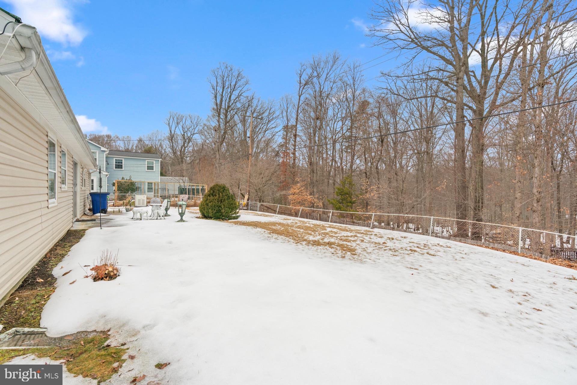 12202 Rustic Hill Drive Bowie, MD 20715 - Photo 28 of 34 a view of road and trees