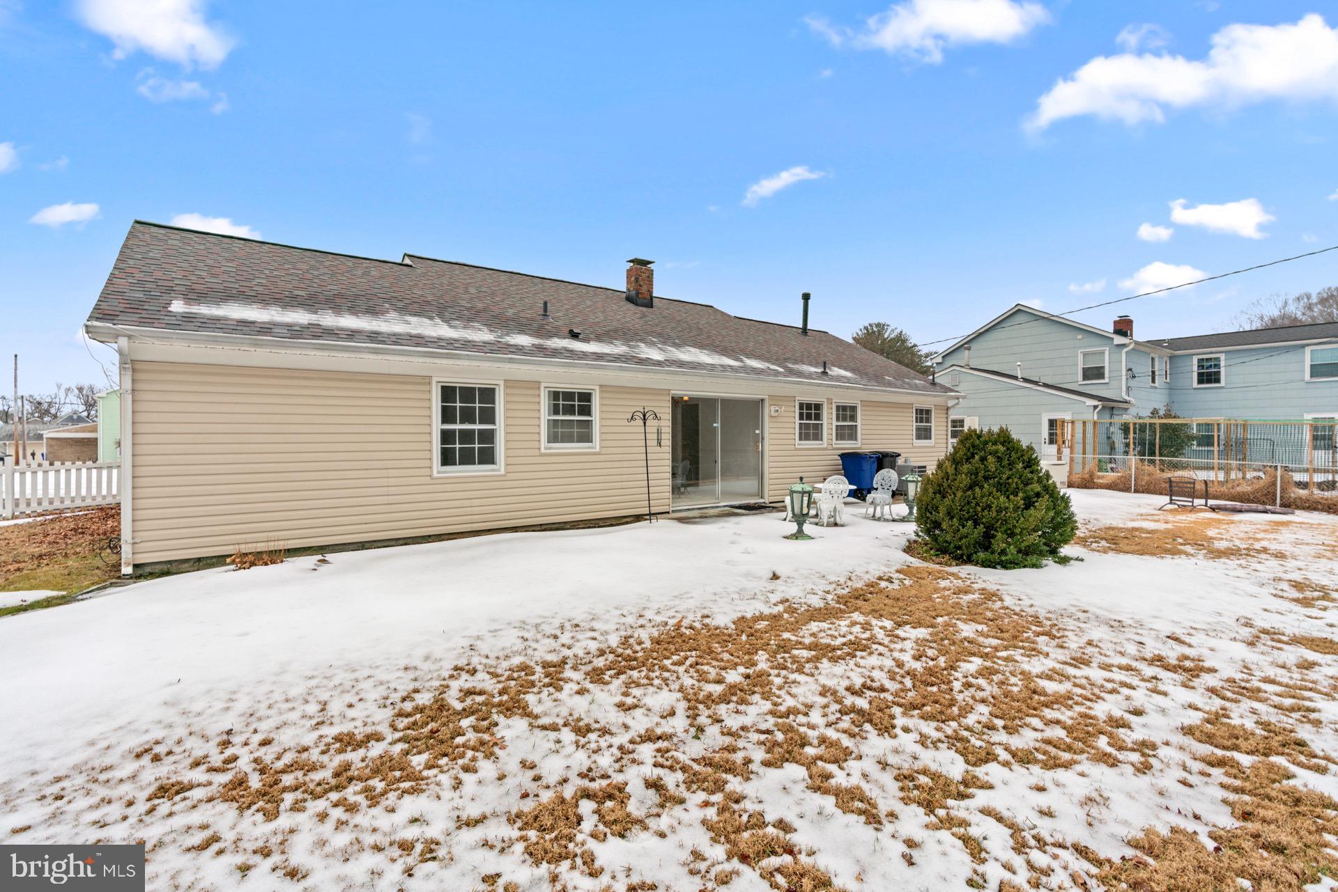 12202 Rustic Hill Drive Bowie, MD 20715 - Photo 33 of 34 a front view of a house with a yard