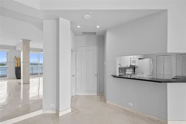 a view of kitchen with wooden floor