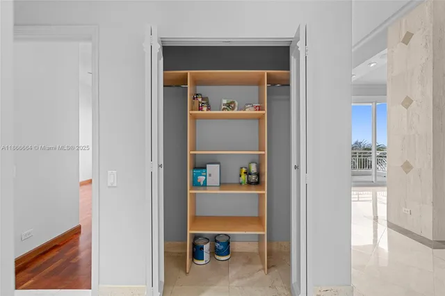 a view of an empty room and window