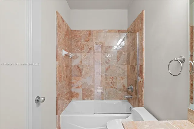 a view of a balcony with chairs