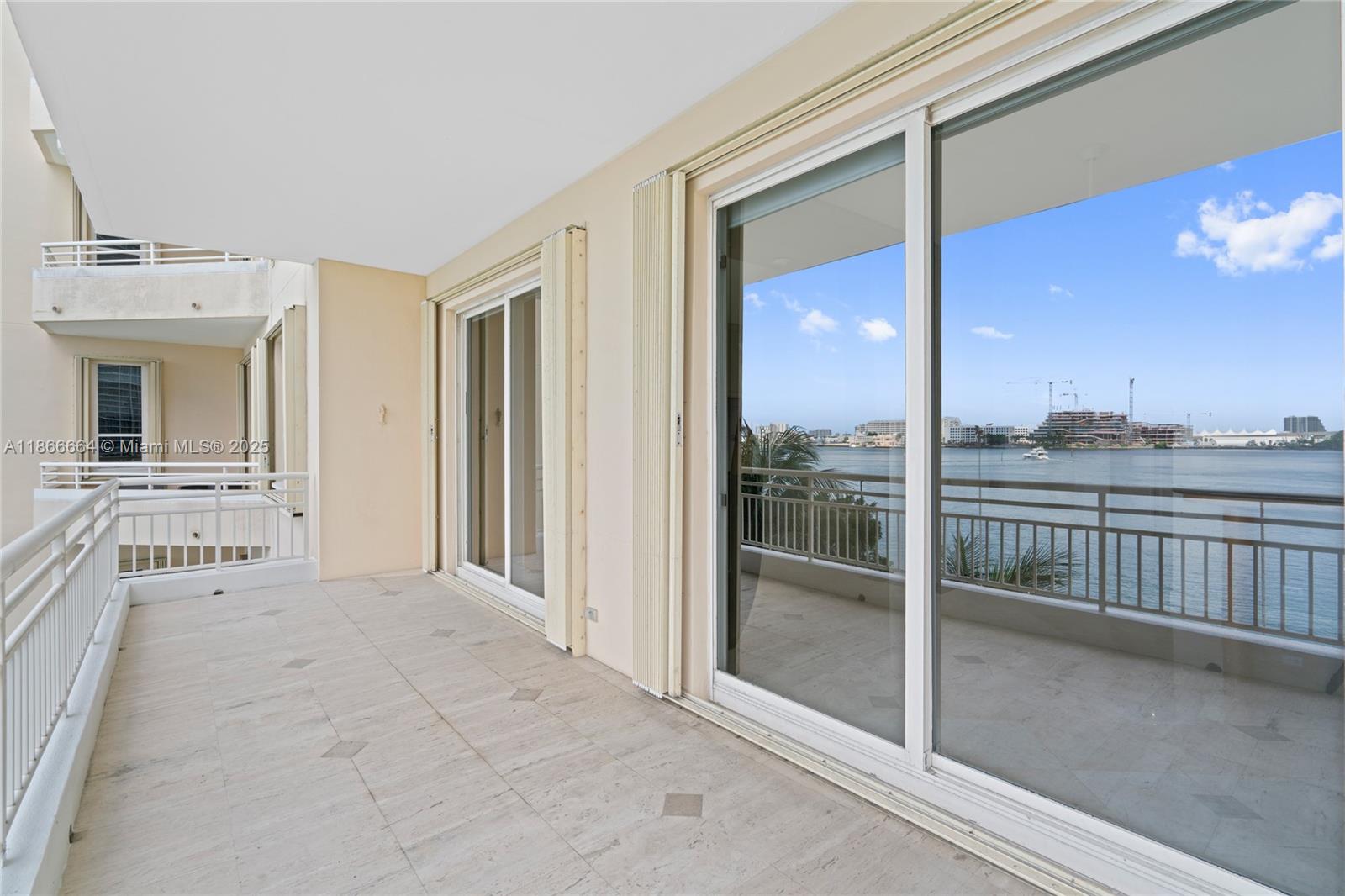 888 Brickell Key Drive, Unit 408 Miami, FL 33131 - Photo 53 of 54 a view of a big room with balcony view