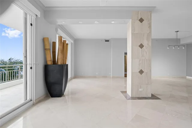 a view of a bathroom with a tub and shower