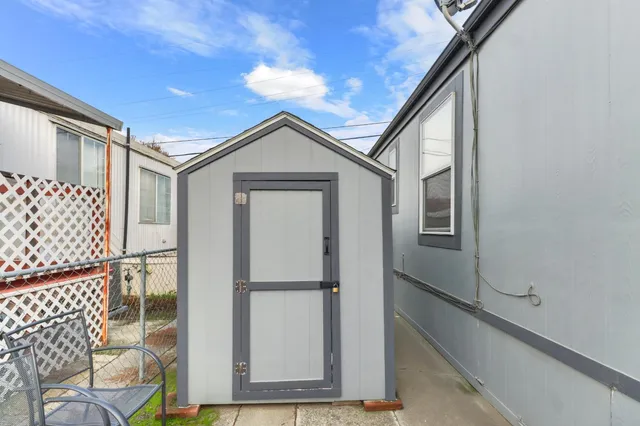 a front view of a house with wooden floor