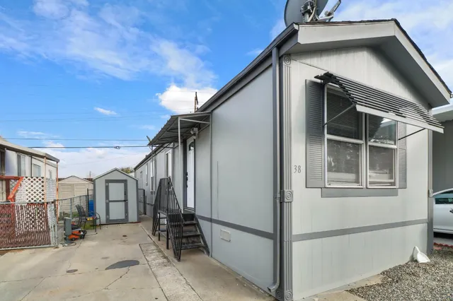 a view of a house with a door and porch