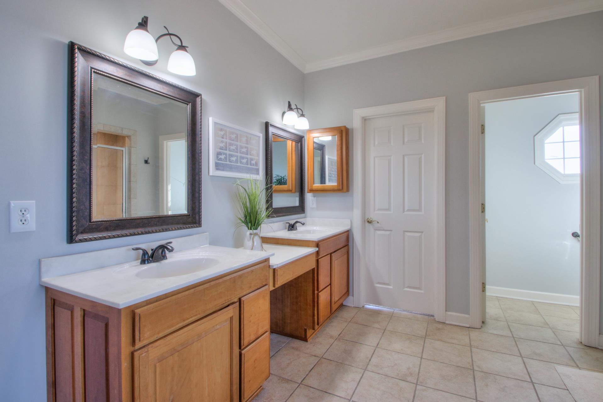 5532 Franklin Road Lebanon, TN 37090 - Photo 14 of 30 a bathroom with a sink and a mirror