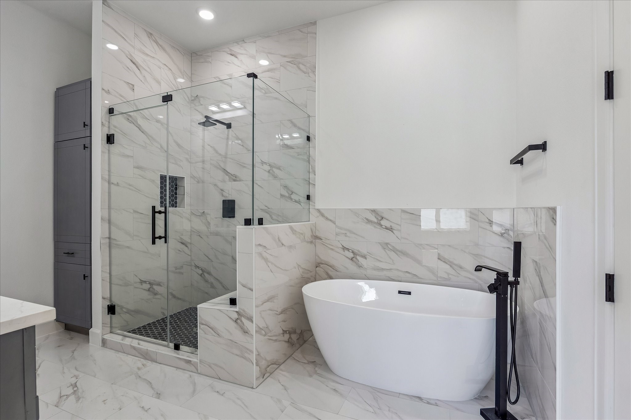 9426 Campbell Road, Unit A Houston, TX 77080 - Photo 10 of 17 a bathroom with a bathtub and shower