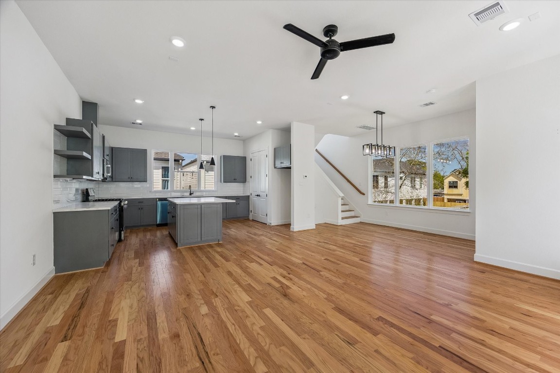 9426 Campbell Road, Unit A Houston, TX 77080 - Photo 7 of 17 The second-floor main living area is thoughtfully designed to offer an elevated blend of comfort and sophistication. Bathed in natural light, this open-concept space seamlessly connects the living, dining, and kitchen areas—creating an ideal setting for both everyday living and effortless entertaining. Clean architectural lines and refined finishes enhance the sense of openness, while the well-appointed layout provides a warm and inviting atmosphere.