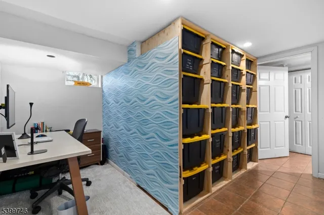 a view of a workspace with furniture