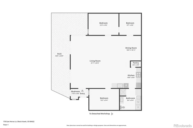 a backyard of a house with a bench and wooden fence