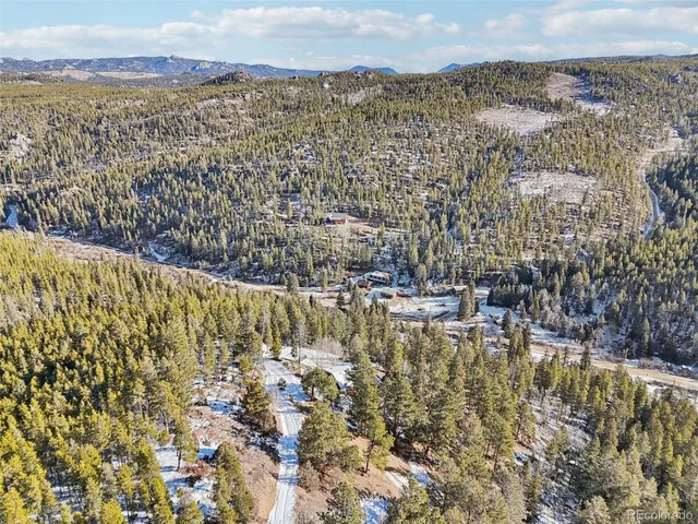 a view of mountain and a mountain