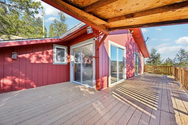 a porch with view of wooden floor