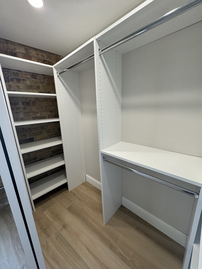 601 Green Bay Road, Unit 204 Wilmette, IL 60091 - Photo 12 of 19 a view of walk in closet with empty racks