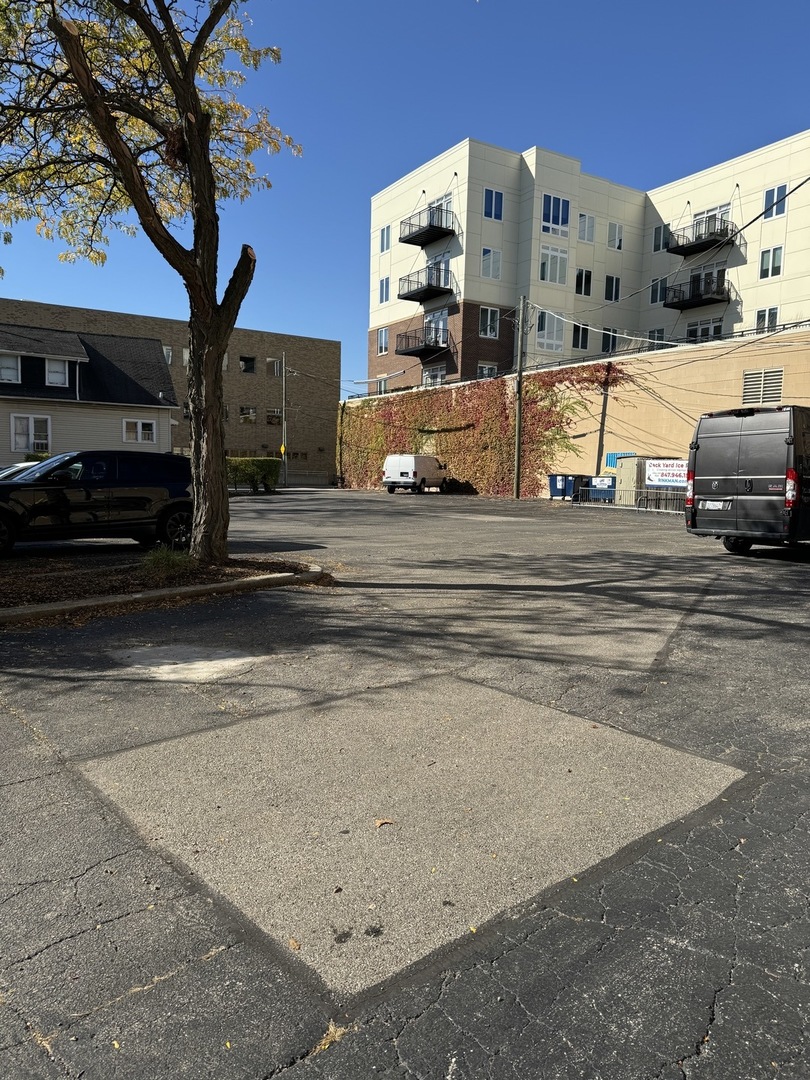 601 Green Bay Road, Unit 204 Wilmette, IL 60091 - Photo 14 of 19 a view of building with car parked
