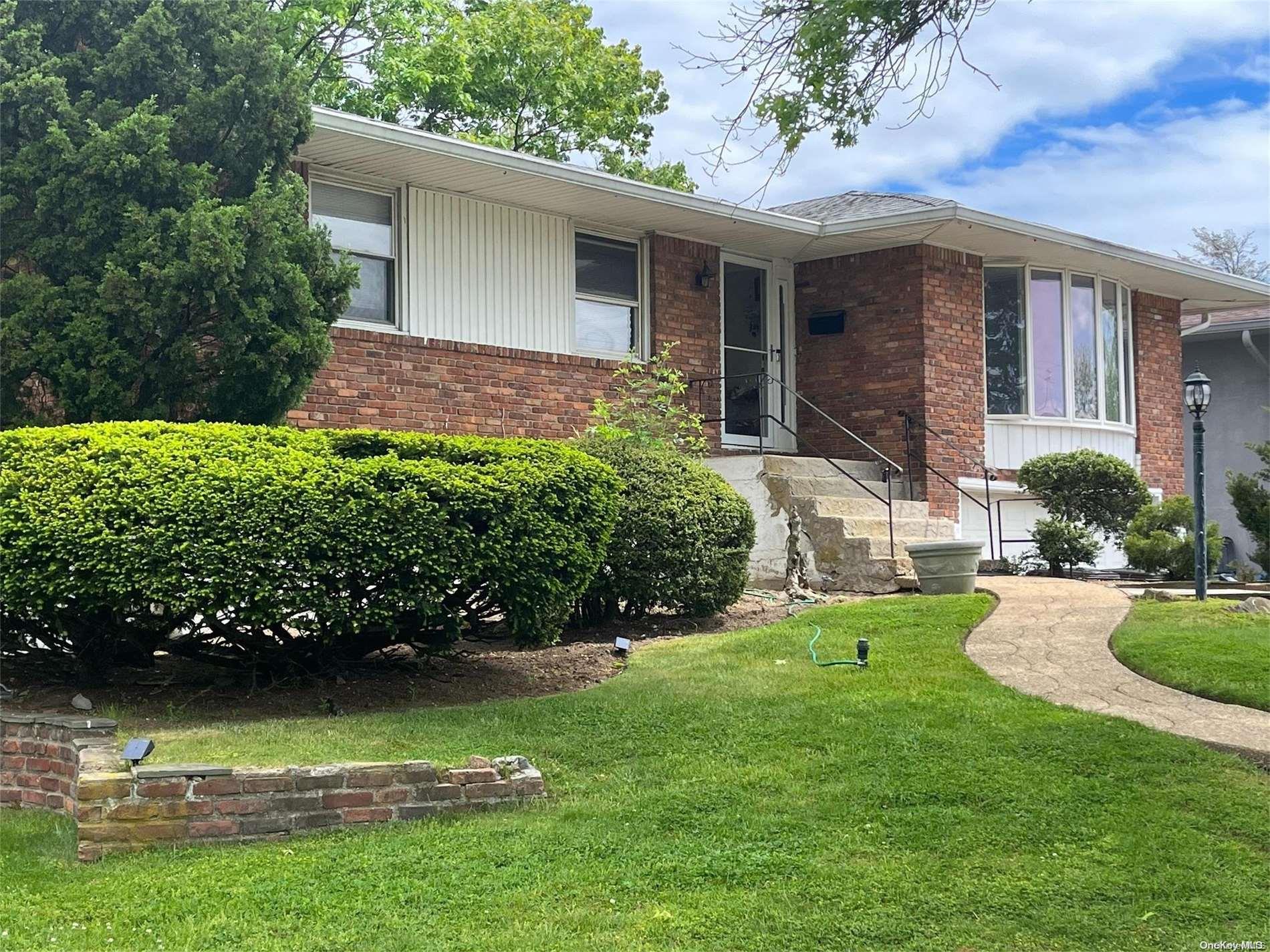 500 Golf Valley Stream, NY 11581 - Photo 1 of 1 a view of a yard in front of house