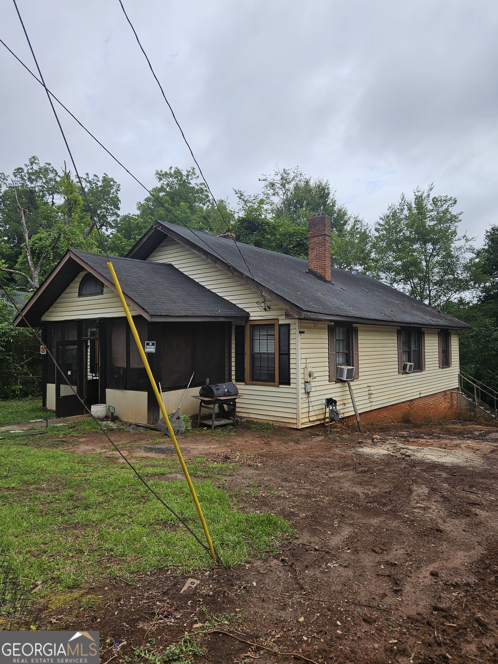 151 G Circle Thomaston, GA 30286 - Photo 1 of 3 a backyard of a house with table and chairs