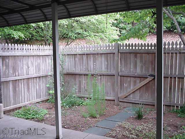 2950 F St Marks Road Southwest Winston-Salem, NC 27103 - Photo 6 of 7 Other. Outside patio has lovely flowers and privacy fence
