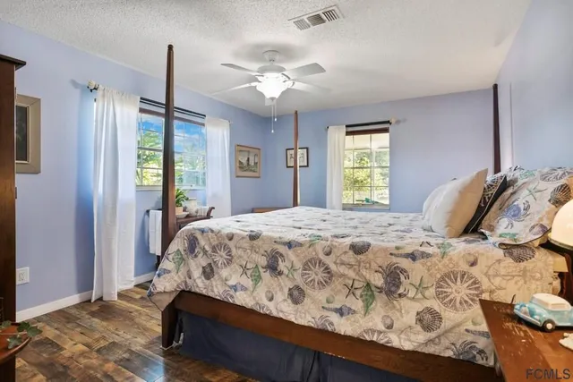 a bathroom with a shower and a window