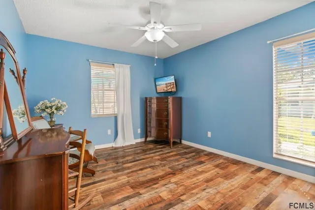 a view of swimming pool with lounge chair