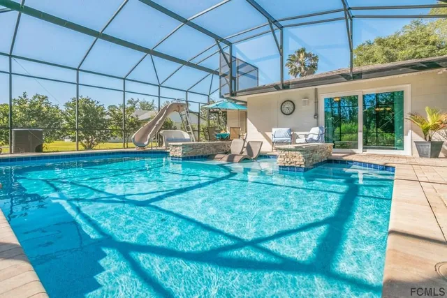 a view of backyard with a garden and plants