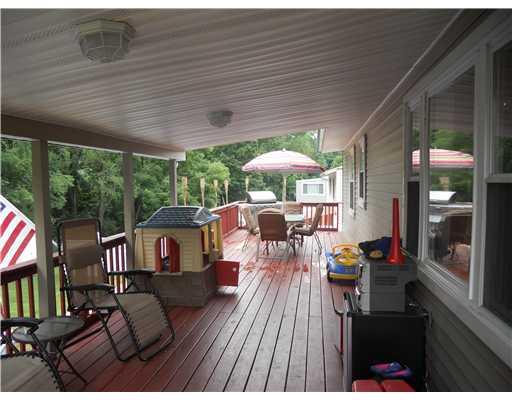 458 Donnell Road Lower Burrell, PA 15068 - Photo 2 of 18 Patio/Deck. Entire back of home boasts a huge covered porch attached by a set of stairs to access the "almost new" above ground porch. This covered deck is the perfect setting for leasure family gatherings. Easy access to lower patio.
