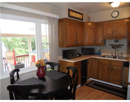 458 Donnell Road Lower Burrell, PA 15068 - Photo 5 of 18 Kitchen. Enjoy your morning coffee in the light airy kitchen that is tastefully decorated with new "wood look" laminate flooring and stainless steel appliances.