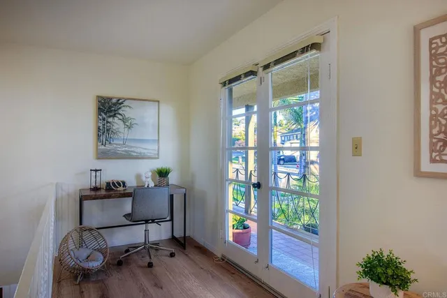 a workspace with furniture and a window