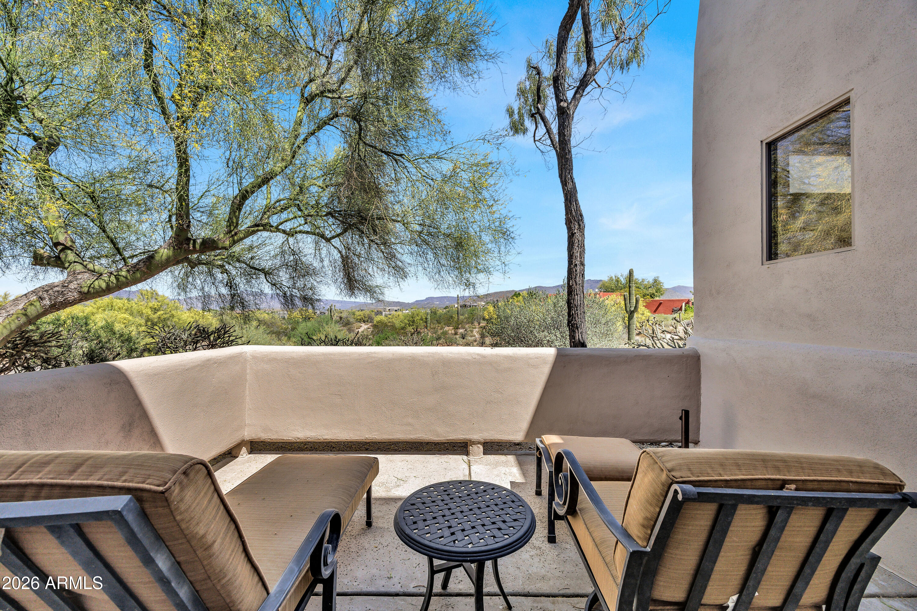 7402 Hum Road, Unit 19 Carefree, AZ 85377 - Photo 12 of 25 a view of table and chair with wooden floor