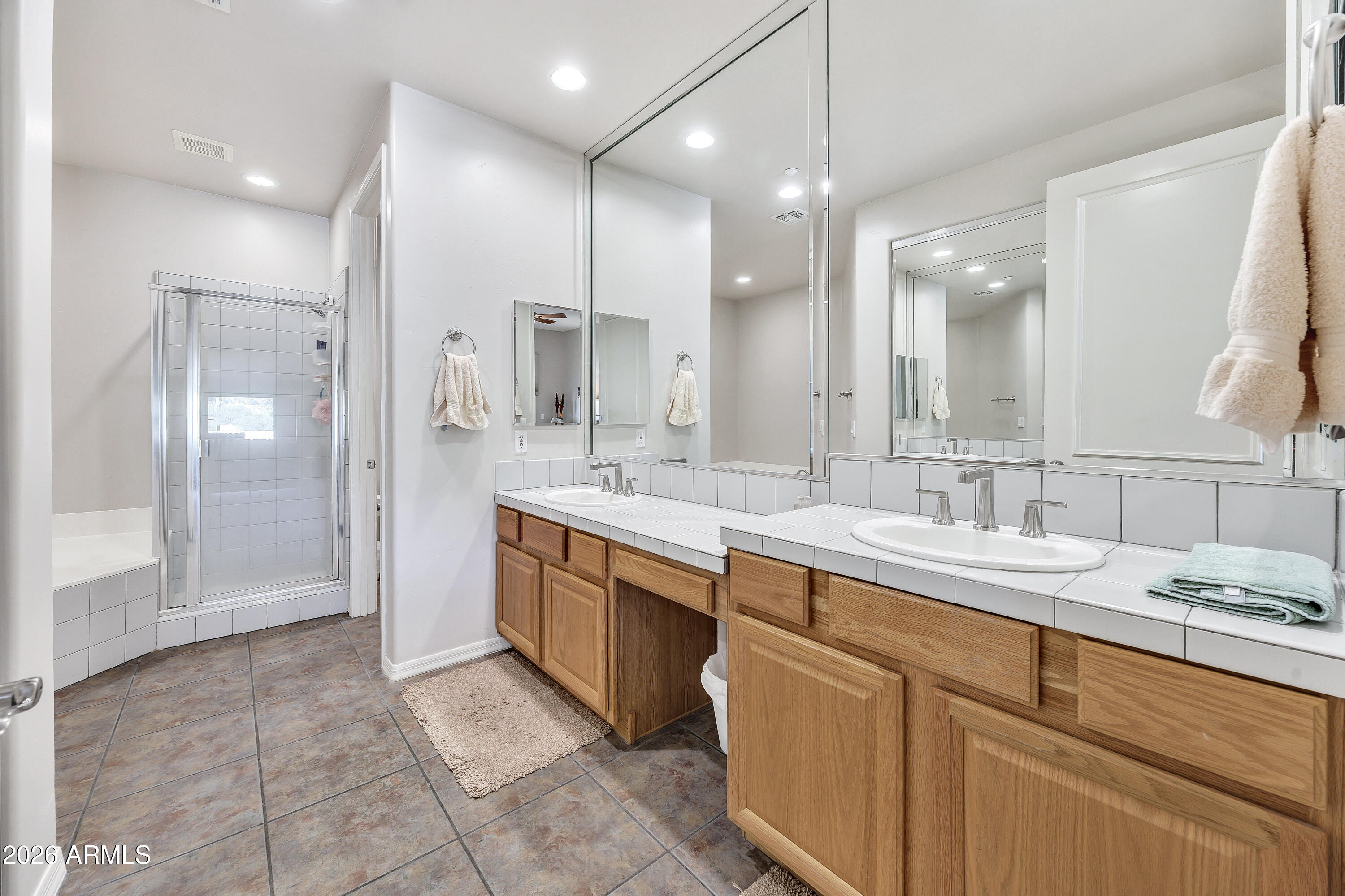 7402 Hum Road, Unit 19 Carefree, AZ 85377 - Photo 14 of 25 a large bathroom with a sink and a mirror