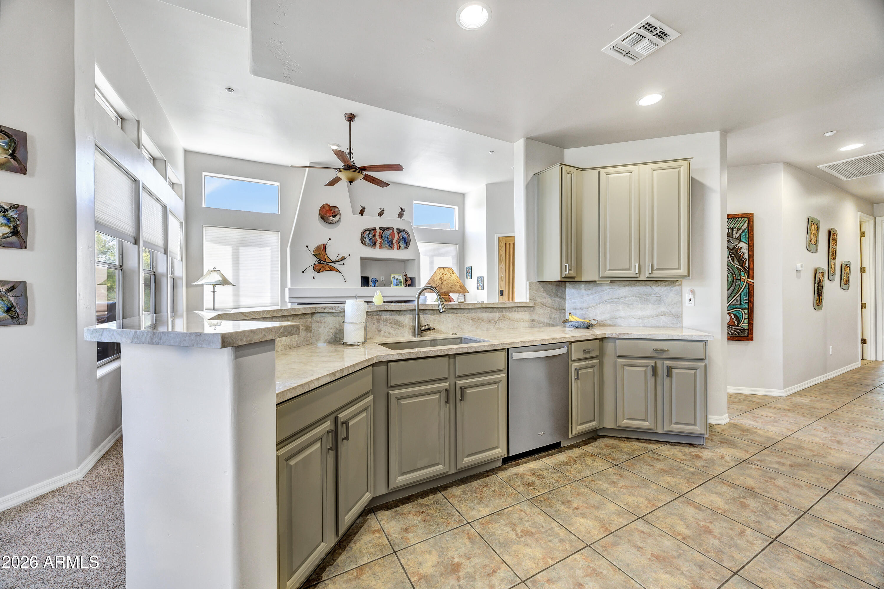 7402 Hum Road, Unit 19 Carefree, AZ 85377 - Photo 7 of 25 a kitchen with a sink cabinets and window