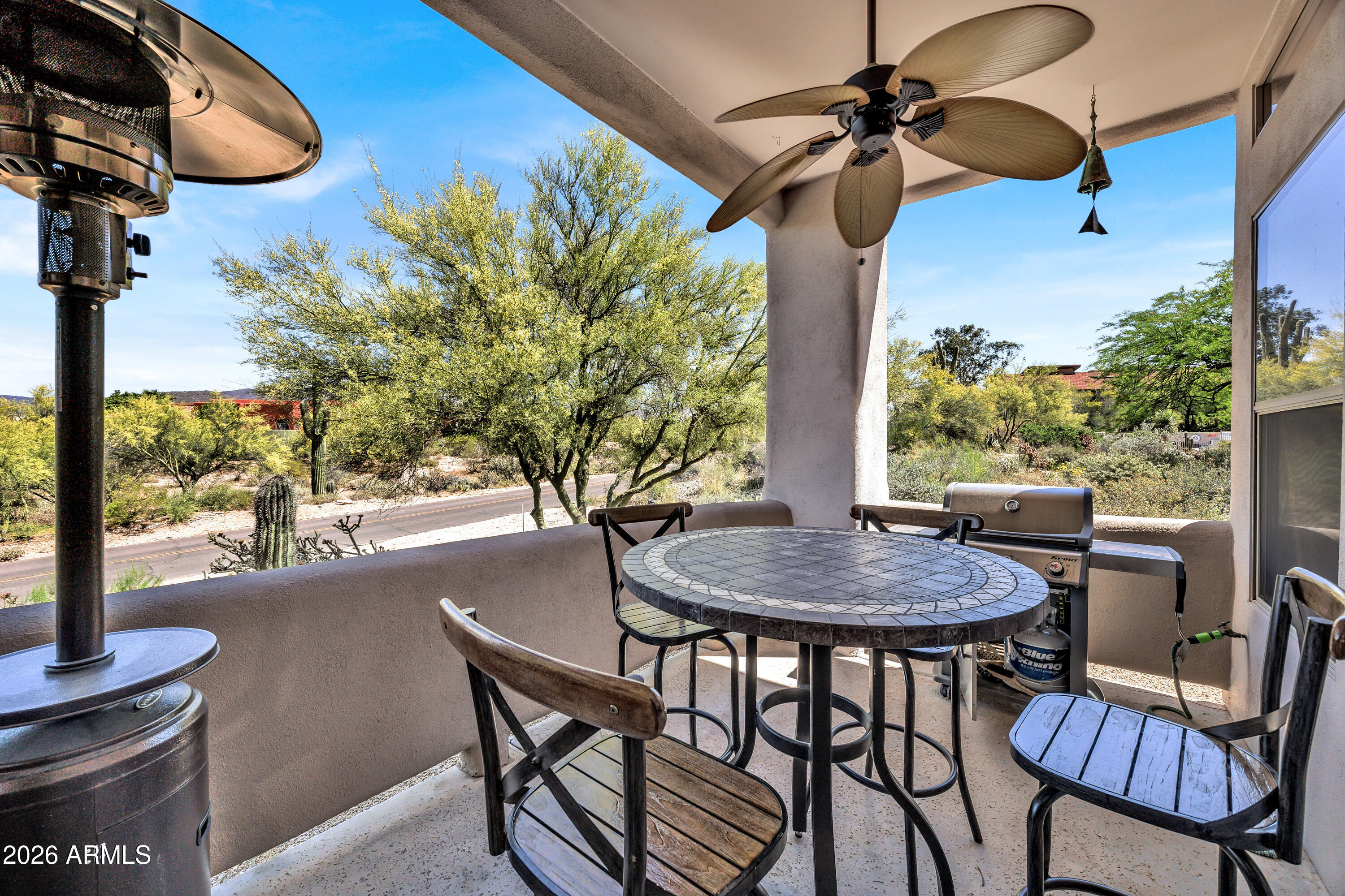 7402 Hum Road, Unit 19 Carefree, AZ 85377 - Photo 8 of 25 a dining room with furniture and window