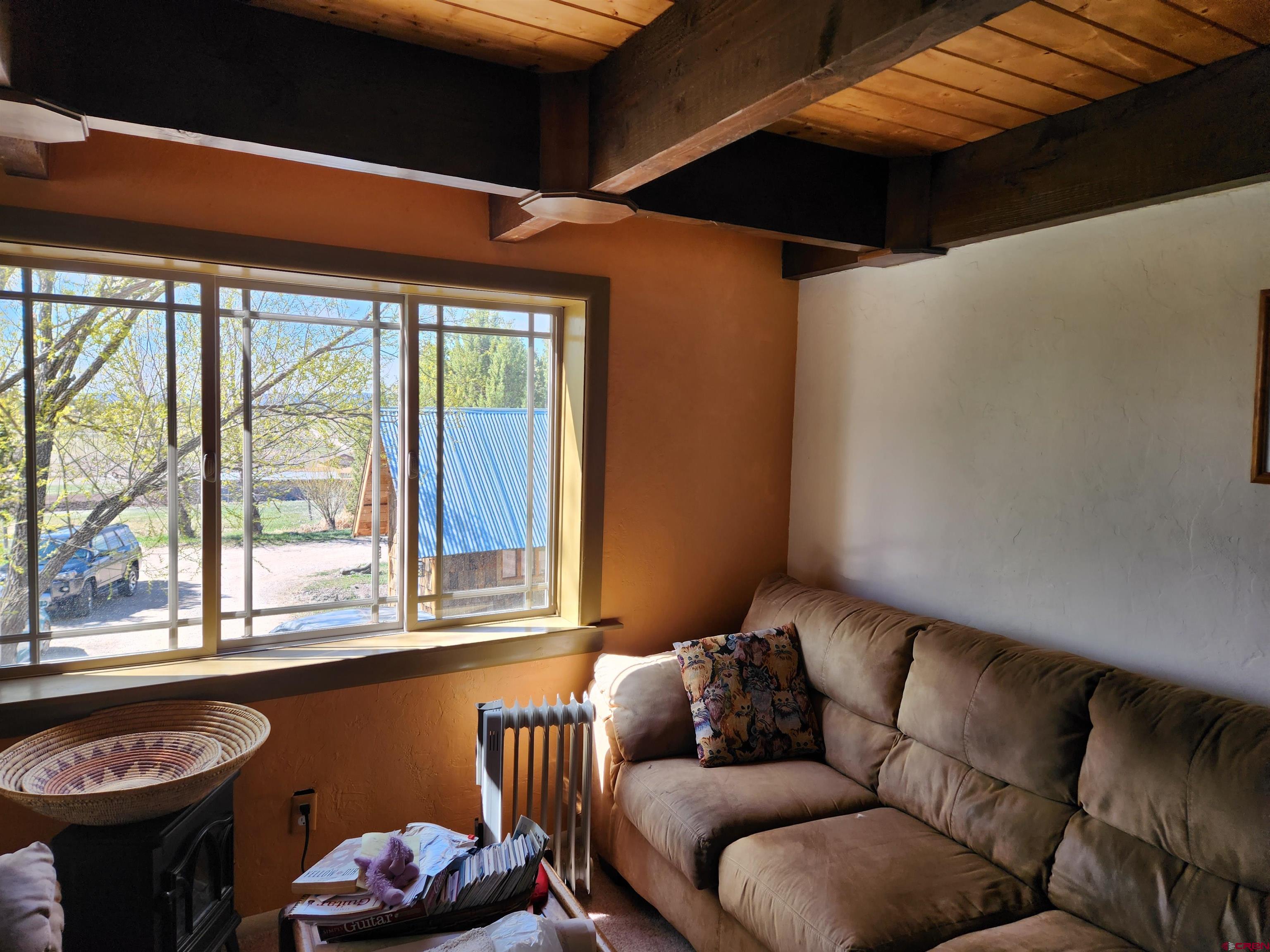 8654 Highway 172 Ignacio, CO 81137 - Photo 18 of 35 a living room with furniture and a window