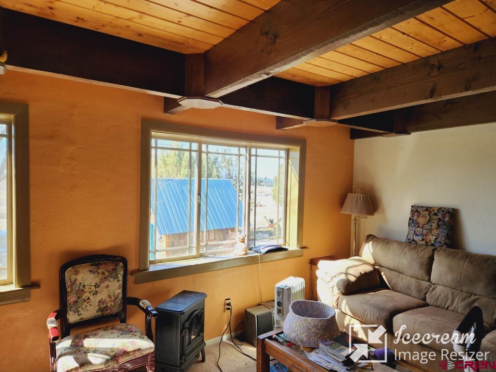 8654 Highway 172 Ignacio, CO 81137 - Photo 20 of 35 a living room with furniture and a window