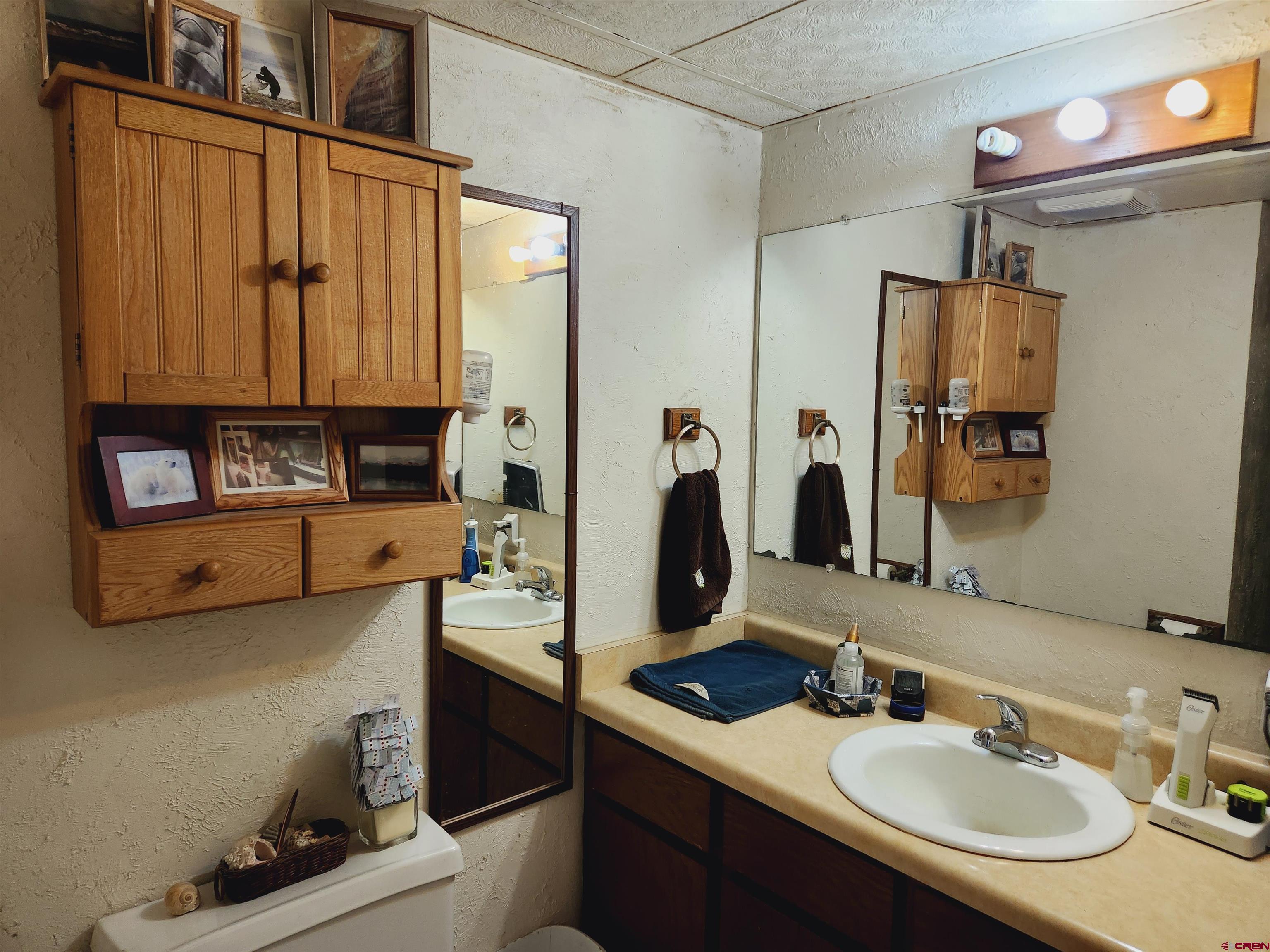 8654 Highway 172 Ignacio, CO 81137 - Photo 7 of 35 a bathroom with a sink double vanity and a mirror