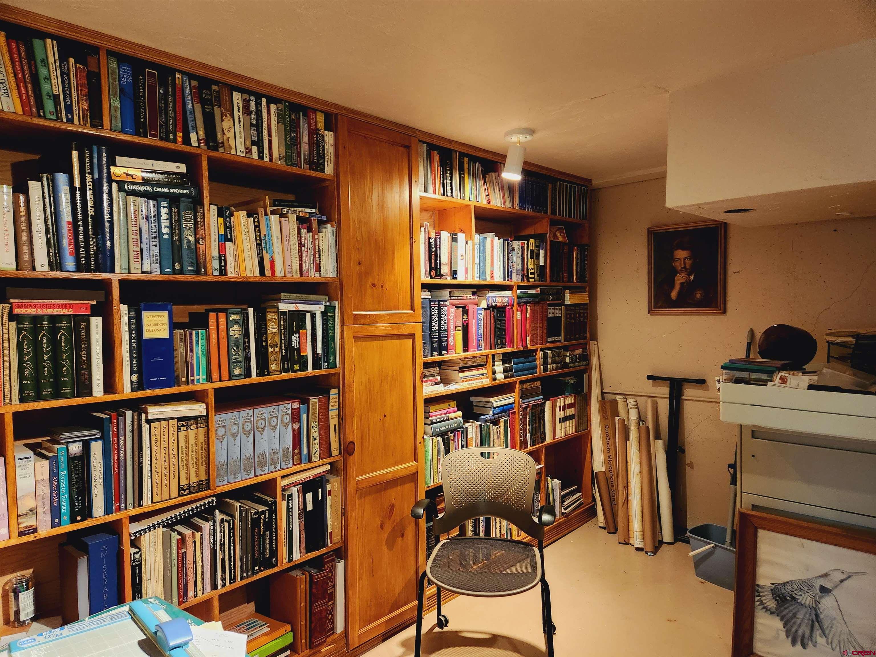 8654 Highway 172 Ignacio, CO 81137 - Photo 10 of 35 a room with furniture and book shelf