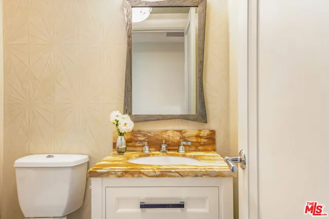 a bathroom with a sink and a toilet