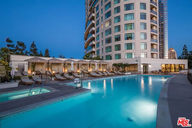 a view of a swimming pool with a patio