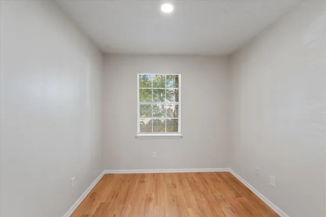 a view of a room that has a window in it