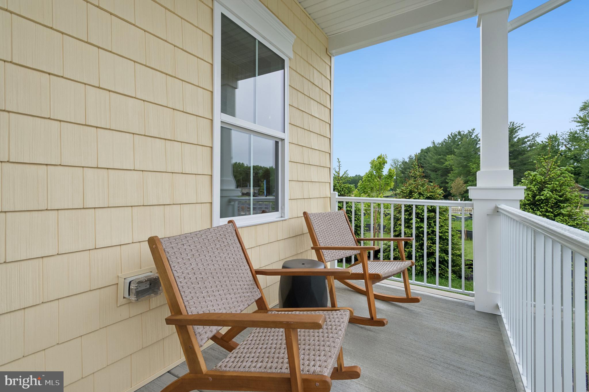 27 Butternut Drive, Unit 14 Berlin, NJ 08009 - Photo 22 of 38 a view of two chairs in the balcony