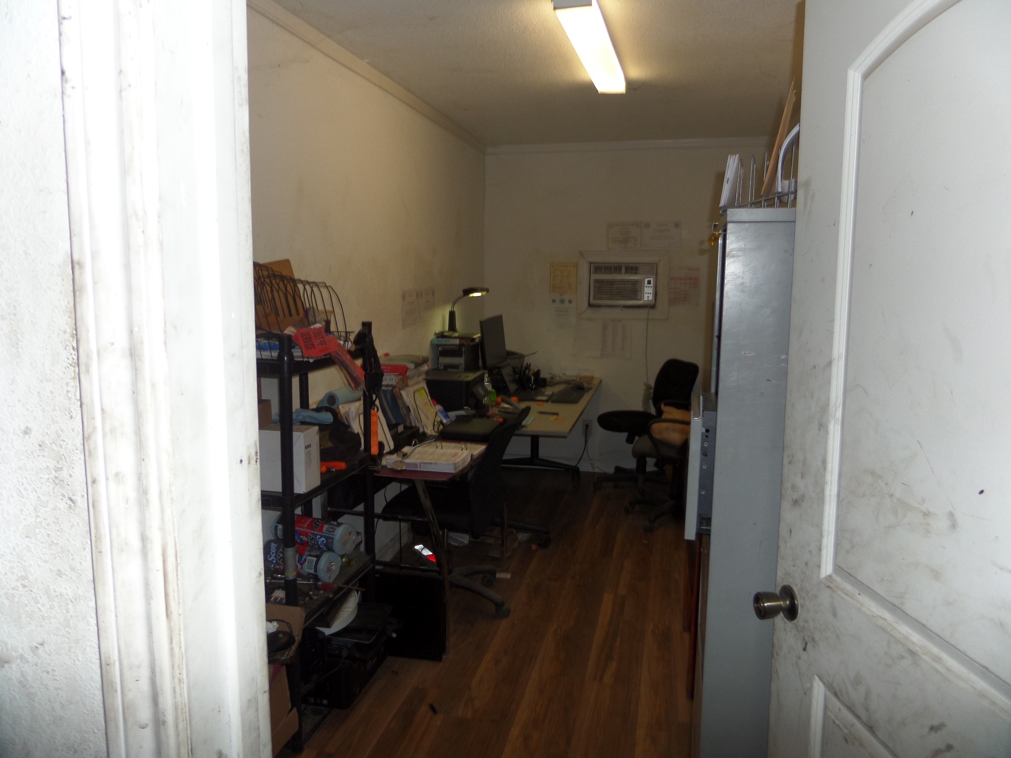 9700 Mykawa Road Houston, TX 77048 - Photo 33 of 48 a view of a hallway with workspace and living room
