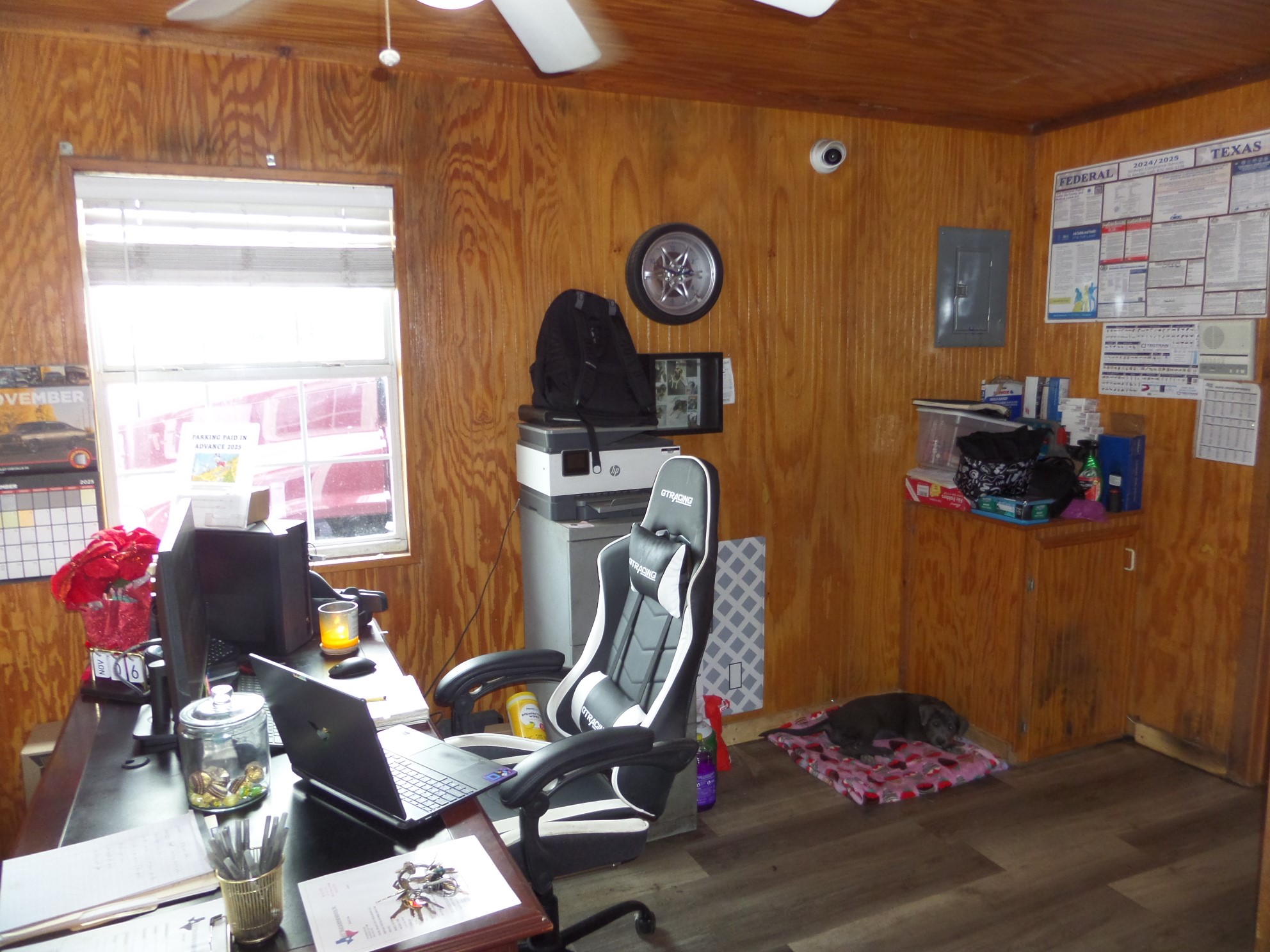 9700 Mykawa Road Houston, TX 77048 - Photo 43 of 48 a view of workspace with wooden wall paintings and a window