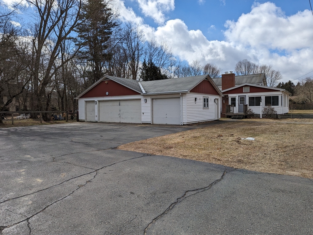 125 Plumtree Road Sunderland, MA 01375 - Photo 1 of 41 a front of a house with a garden