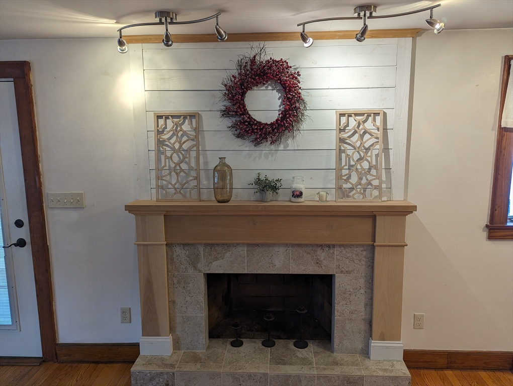 125 Plumtree Road Sunderland, MA 01375 - Photo 14 of 41 a bathroom with a fireplace and a light fixture